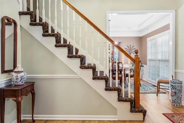 12806 Goddard Ave, Overland Park, KS 66213 - staircase with wood finished floors and ornamental molding