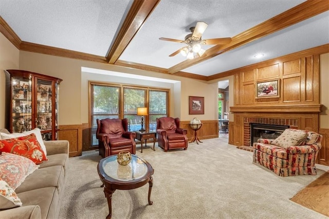 12806 Goddard Ave, Overland Park, KS 66213 - living room with crown molding, a wainscoted wall, a textured ceiling, light colored carpet, and beamed ceiling