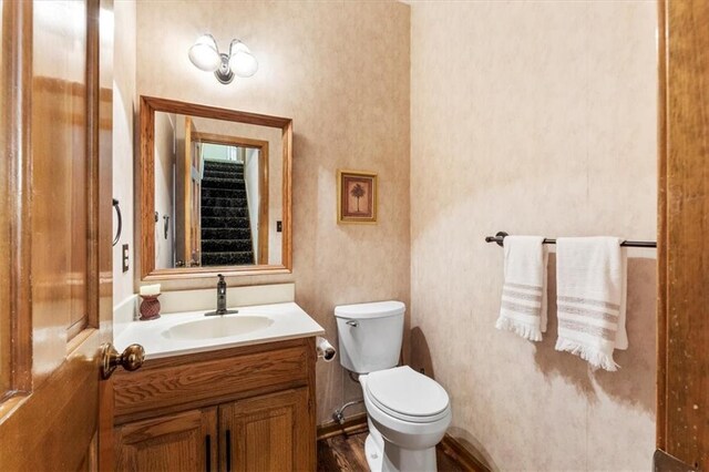 12806 Goddard Ave, Overland Park, KS 66213 - bathroom featuring toilet and vanity