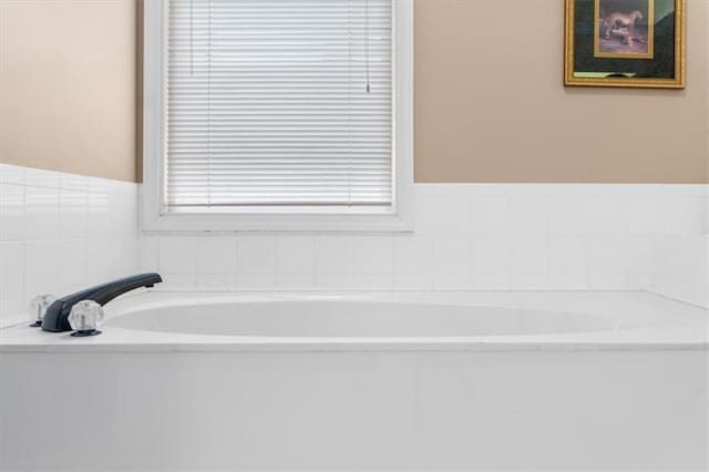 12806 Goddard Ave, Overland Park, KS 66213 - bathroom with a bath