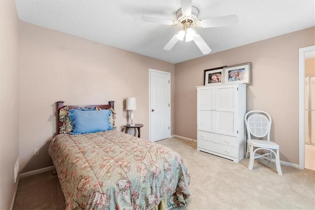 12806 Goddard Ave, Overland Park, KS 66213 - bedroom featuring light carpet, baseboards, and ceiling fan