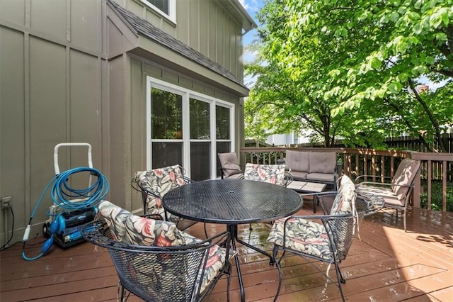 12806 Goddard Ave, Overland Park, KS 66213 - wooden deck with an outdoor hangout area