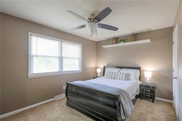 606 W Smith St, Spring Hill, KS 66083 - bedroom featuring light colored carpet, ceiling fan, and a textured ceiling