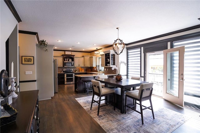 3832 SW Boulder Dr, Lees Summit, MO 64082 - dining space featuring ornamental molding, dark wood-type flooring, and recessed lighting
