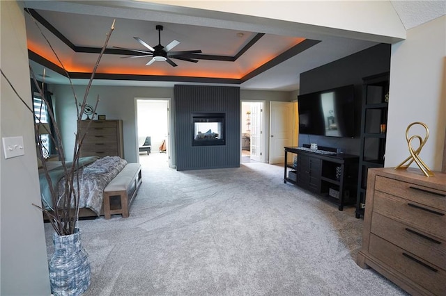 3832 SW Boulder Dr, Lees Summit, MO 64082 - carpeted bedroom with a tray ceiling