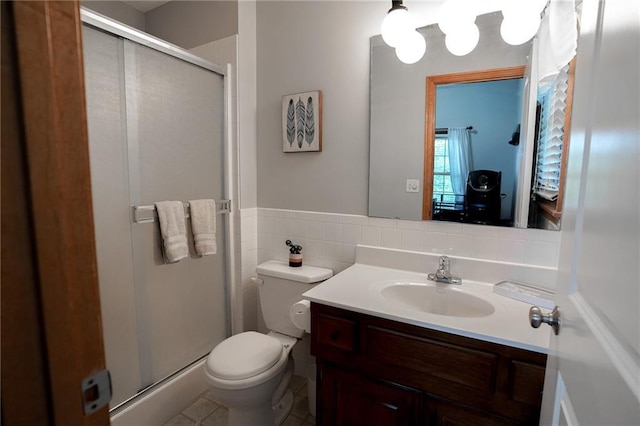 3832 SW Boulder Dr, Lees Summit, MO 64082 - full bath with vanity, a stall shower, toilet, tile walls, and tile patterned floors