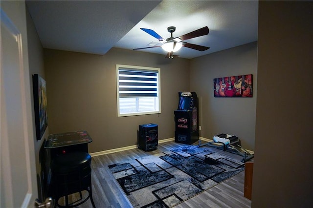 3832 SW Boulder Dr, Lees Summit, MO 64082 - bedroom with wood finished floors, baseboards, and ceiling fan