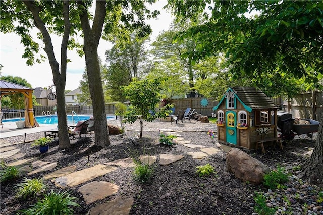 3832 SW Boulder Dr, Lees Summit, MO 64082 - fenced backyard featuring a gazebo and a patio area