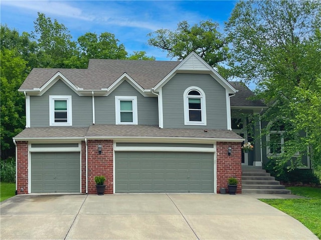 3700 NW Platte Brooke Dr, Kansas City, MO 64151 - view of front of home with a garage, concrete driveway, brick siding, and a shingled roof
