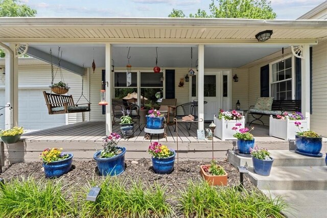 6246 Woodland Dr, Shawnee, KS 66218 - entrance to property featuring a porch