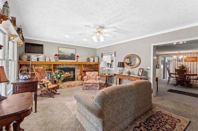 6246 Woodland Dr, Shawnee, KS 66218 - carpeted living area featuring a textured ceiling, ornamental molding, a ceiling fan, and a fireplace