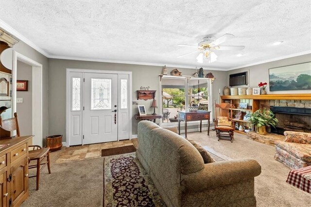 6246 Woodland Dr, Shawnee, KS 66218 - carpeted living area featuring a ceiling fan, crown molding, a textured ceiling, and a stone fireplace