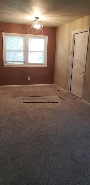 306 Morningside Dr, Richmond, MO 64085 - unfurnished room with carpet and baseboards