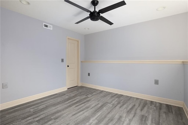 486 S 137th Pl, Bonner Springs, KS 66012 - spare room featuring wood finished floors, ceiling fan, baseboards, and recessed lighting