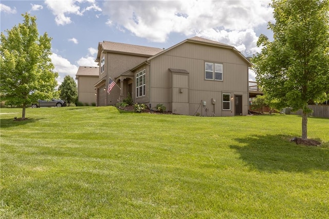 486 S 137th Pl, Bonner Springs, KS 66012 - back of house featuring a yard
