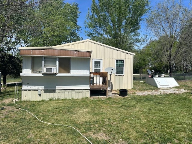 63 Clark Rd, Mapleton, KS 66754 - view of home's exterior featuring a lawn and cooling unit