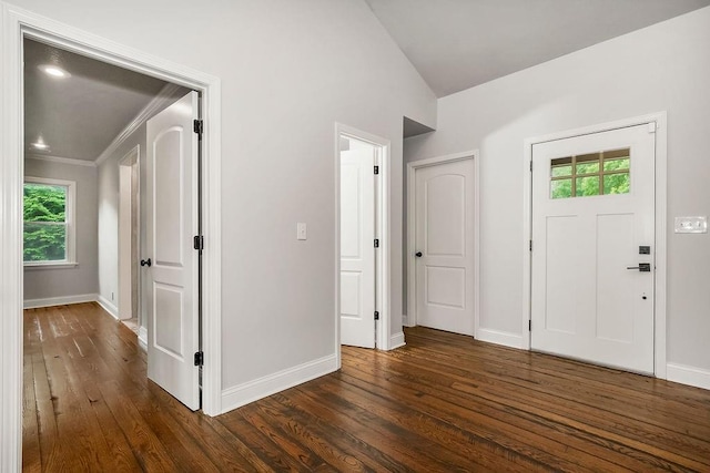 2308 W 95th St, Leawood, KS 66206 - foyer entrance featuring dark wood finished floors, lofted ceiling, and crown molding