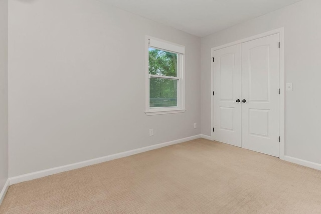 2308 W 95th St, Leawood, KS 66206 - unfurnished bedroom with light carpet and a closet