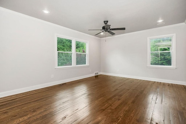 2308 W 95th St, Leawood, KS 66206 - unfurnished room with healthy amount of natural light, dark wood finished floors, a ceiling fan, crown molding, and recessed lighting
