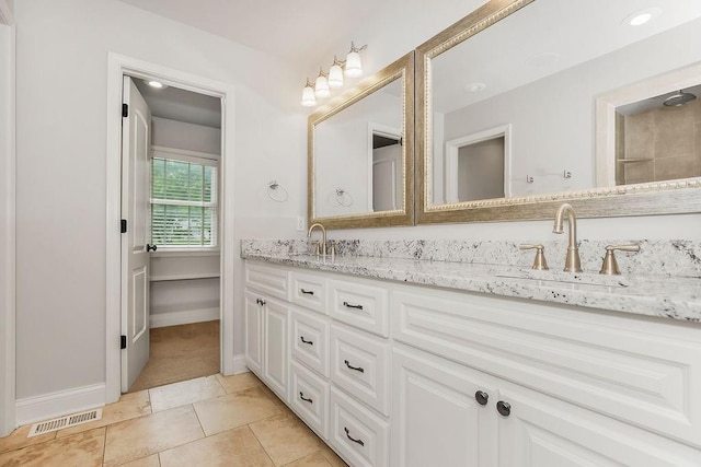 2308 W 95th St, Leawood, KS 66206 - bathroom with double vanity and tile patterned flooring