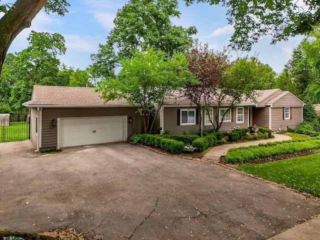 2308 W 95th St, Leawood, KS 66206 - ranch-style home featuring driveway and a garage
