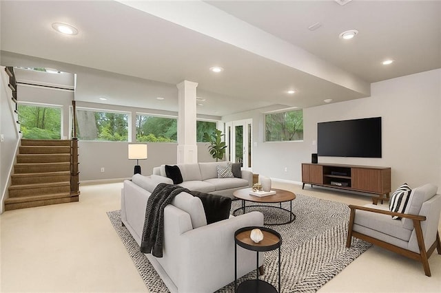 2308 W 95th St, Leawood, KS 66206 - living area featuring light carpet, recessed lighting, plenty of natural light, decorative columns, and stairs