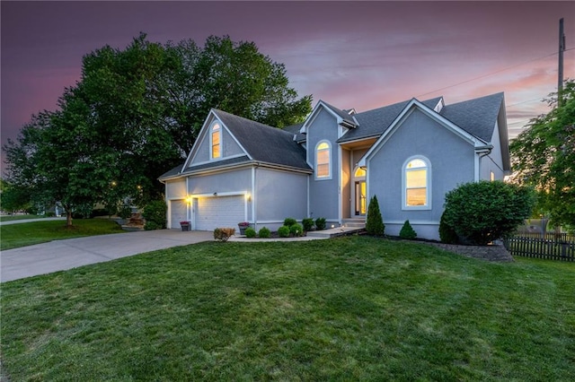 5916 NE Turquoise Dr, Lees Summit, MO 64064 - view of front of home featuring concrete driveway and stucco siding