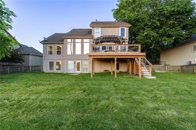 5916 NE Turquoise Dr, Lees Summit, MO 64064 - back of property featuring stairs and a wooden deck