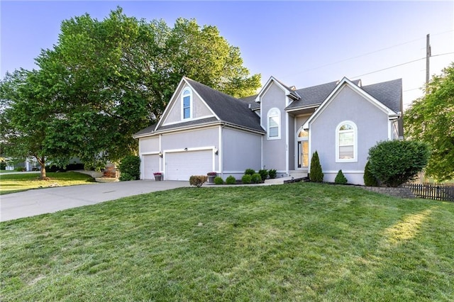5916 NE Turquoise Dr, Lees Summit, MO 64064 - view of front of home with concrete driveway and stucco siding