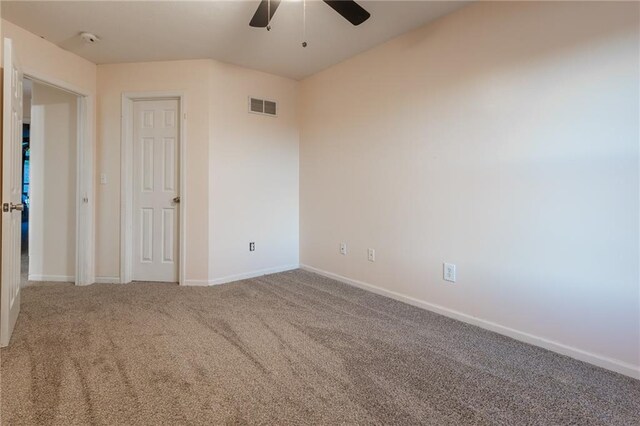 5916 NE Turquoise Dr, Lees Summit, MO 64064 - unfurnished bedroom featuring carpet, baseboards, and ceiling fan