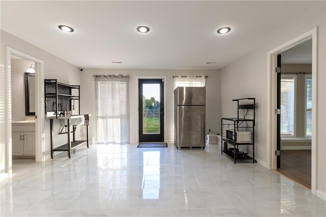 5916 NE Turquoise Dr, Lees Summit, MO 64064 - entrance foyer featuring recessed lighting, baseboards, and light marble finish floors