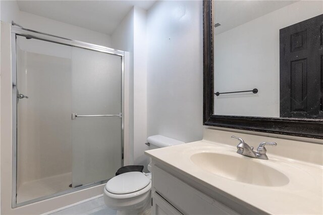 5916 NE Turquoise Dr, Lees Summit, MO 64064 - full bath with a shower stall, vanity, and toilet