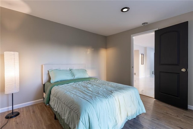 5916 NE Turquoise Dr, Lees Summit, MO 64064 - bedroom featuring wood finished floors and baseboards