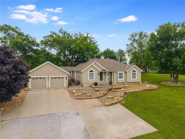 1955 Birmingham Rd, Liberty, MO 64068 - ranch-style house with concrete driveway, a front yard, stucco siding, and a garage
