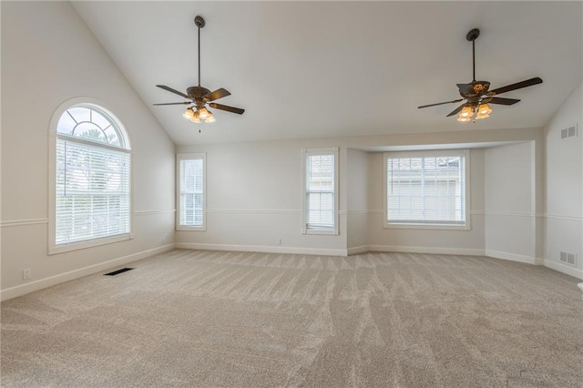 1955 Birmingham Rd, Liberty, MO 64068 - spare room featuring ceiling fan, light carpet, and high vaulted ceiling