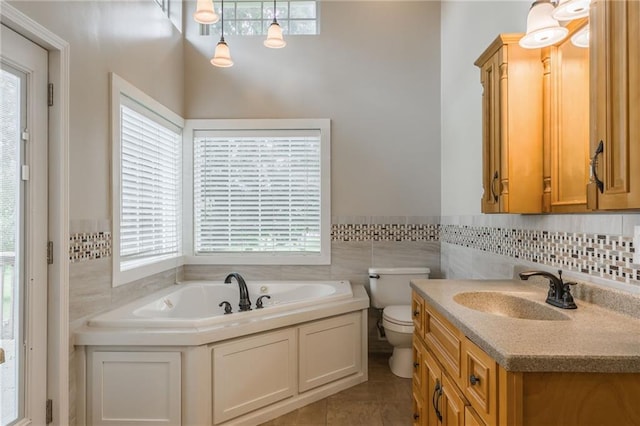 1955 Birmingham Rd, Liberty, MO 64068 - bathroom featuring a bath, tile patterned flooring, vanity, and plenty of natural light