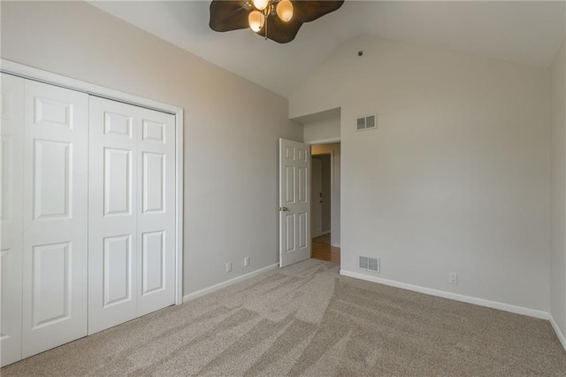1955 Birmingham Rd, Liberty, MO 64068 - unfurnished bedroom featuring carpet, lofted ceiling, a closet, and a ceiling fan