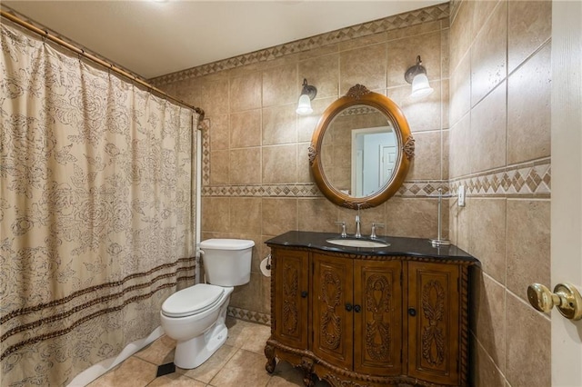 1955 Birmingham Rd, Liberty, MO 64068 - full bathroom featuring vanity, tile patterned flooring, tile walls, and a shower with shower curtain