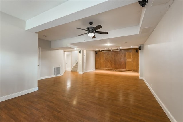 1955 Birmingham Rd, Liberty, MO 64068 - unfurnished living room featuring wood finished floors, stairway, and ceiling fan
