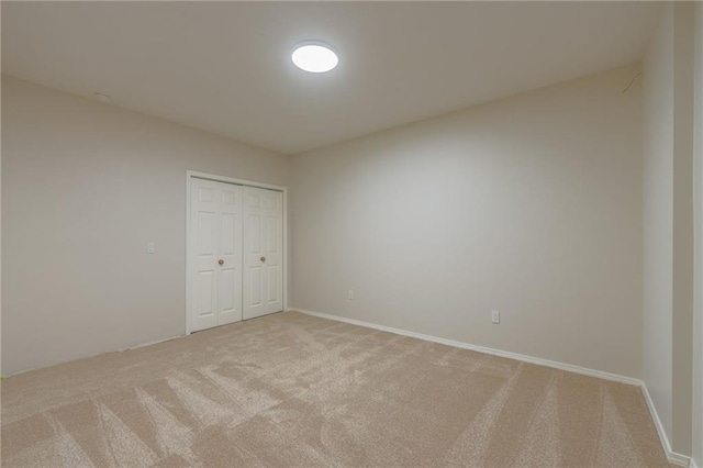 1955 Birmingham Rd, Liberty, MO 64068 - unfurnished bedroom featuring light carpet and a closet