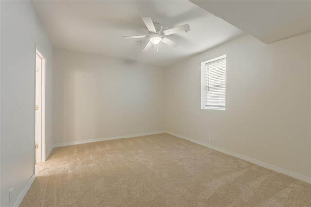 1955 Birmingham Rd, Liberty, MO 64068 - spare room featuring light colored carpet and a ceiling fan