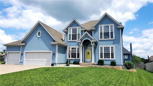 1512 SW 42nd Ct, Lees Summit, MO 64082 - view of front of home featuring stucco siding, driveway, and an attached garage