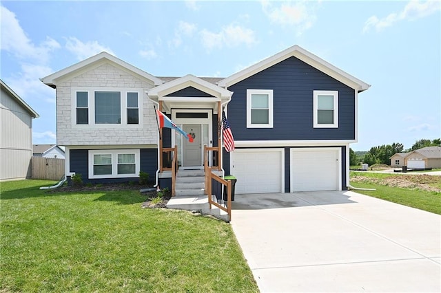 1905 Eagle Dr, Harrisonville, MO 64701 - split foyer home with a garage and driveway