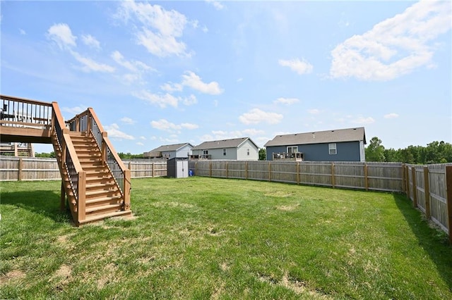 1905 Eagle Dr, Harrisonville, MO 64701 - view of yard with stairway and a wooden deck