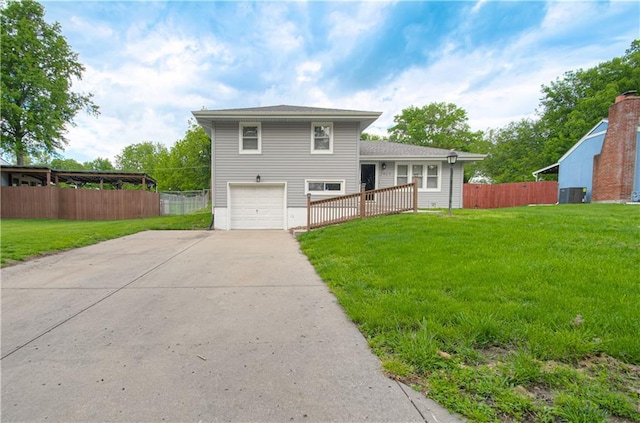 2917 N 83rd Ter, Kansas City, KS 66109 - view of front facade featuring an attached garage and concrete driveway