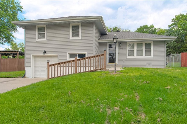 2917 N 83rd Ter, Kansas City, KS 66109 - view of front of home featuring a garage and driveway