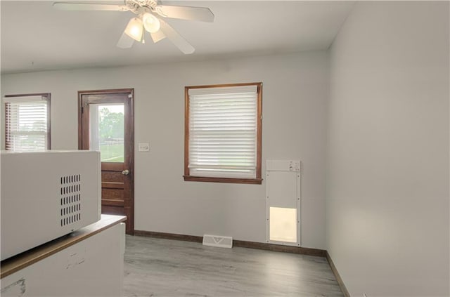 2917 N 83rd Ter, Kansas City, KS 66109 - spare room with baseboards, light wood-style flooring, and a ceiling fan