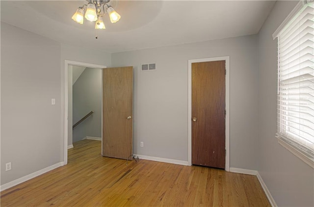 2917 N 83rd Ter, Kansas City, KS 66109 - unfurnished bedroom featuring light wood-style floors and baseboards