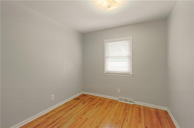2917 N 83rd Ter, Kansas City, KS 66109 - unfurnished room featuring baseboards and light wood finished floors