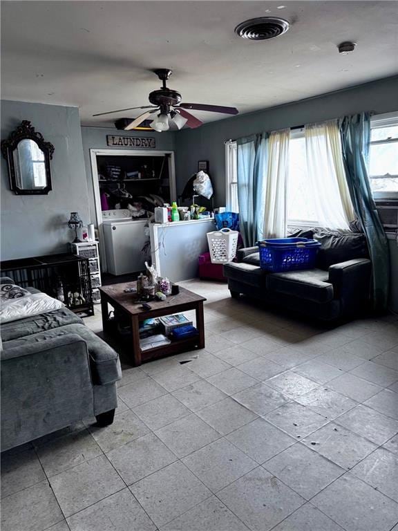 3301 Sioux Ln, Saint Joseph, MO 64503 - living room featuring a ceiling fan and tile patterned flooring